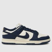 Nike Dunk Low Trainers in Ivory & Navy